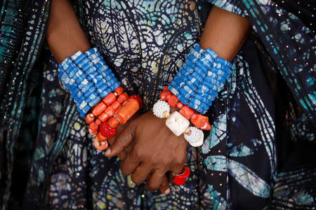 Bracelets are seen on the hands of Nigerian artist and designer Chief Nike Okundaye during a gala marking the launch of a book called "African Twilight: The Vanishing Rituals and Ceremonies of the African Continent" at the African Heritage House in Nairobi, Kenya March 3, 2019. REUTERS/Baz Ratner