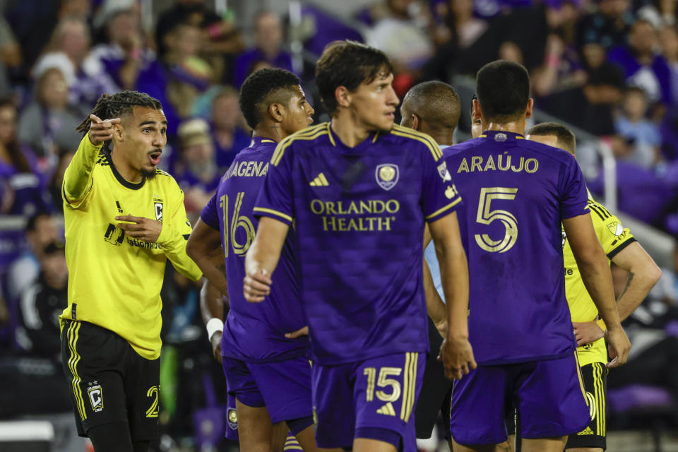 Columbus Crew defender Mohamed Farsi, reacts after play as his team plays Orlando City during the first half of an MLS soccer playoff match, Saturday, Nov. 25, 2023, in Orlando, Fla. (AP Photo/Kevin Kolczynski)