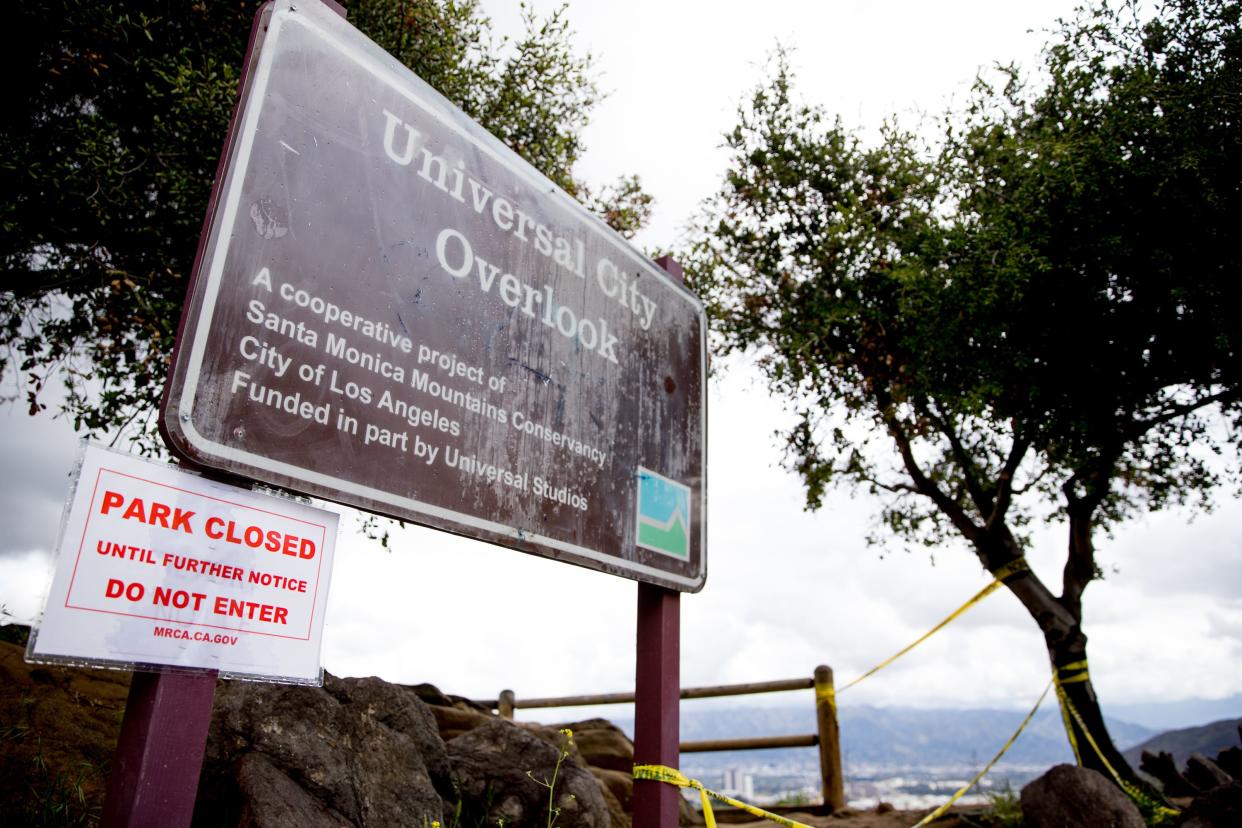 The Universal City Overlook on Mulholland Drive is closed during the coronavirus pandemic on April 8, 2020, in Los Angeles, Calif. COVID-19 has spread to most countries around the world, claiming almost 70,000 lives with infections nearing 1.3 million people.