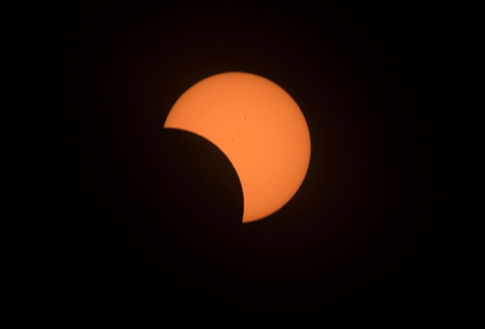The partial solar eclipse wanes at about 11:00 a.m. in Stockton, California, on Aug. 21, 2017.