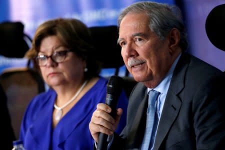 Gloria Maria Borrero, Colombia's Minister of Justice and Law listens as Colombia's Defense Minister Guillermo Botero speaks during a news conference in Bogota, Colombia September 19, 2018. REUTERS/Luisa Gonzalez