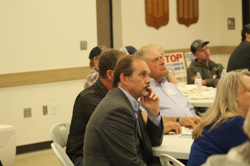 Steven Haugaard attends a rally in opposition to Summit Carbon Solutions' proposed carbon sequestration pipeline in Mellette on Sunday evening.