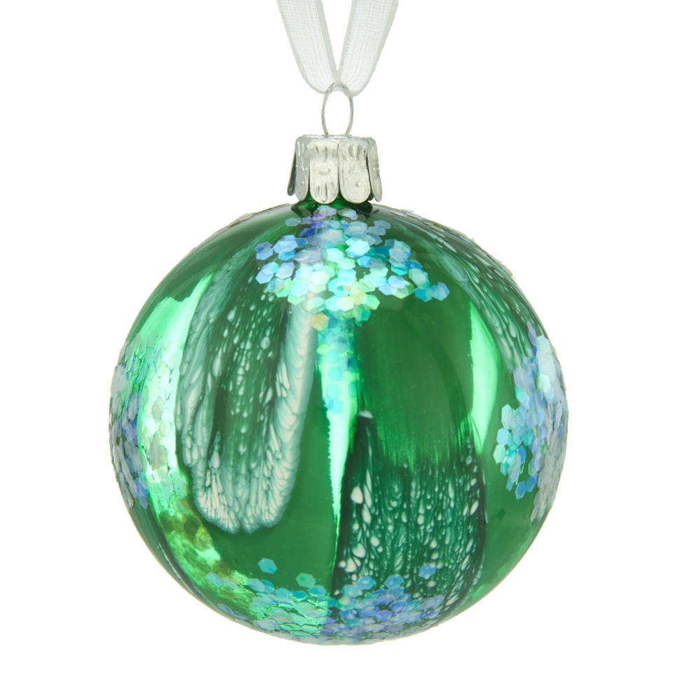 <p><strong>BUY NOW: <a rel="nofollow noopener" href="https://www.johnlewis.com/john-lewis-into-the-woods-marbled-sequin-bauble-green/p3230202" target="_blank" data-ylk="slk:Into the Woods Green Marbled Sequin Bauble, £4, John Lewis;elm:context_link;itc:0;sec:content-canvas" class="link ">Into the Woods Green Marbled Sequin Bauble, £4, John Lewis</a></strong></p>