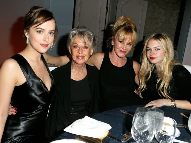 <p>Jeff Vespa/Getty</p> Dakota Johnson, Tippi Hedren, Melanie Griffith and Stella Banderas attend the 22nd Annual ELLE Women in Hollywood Awards