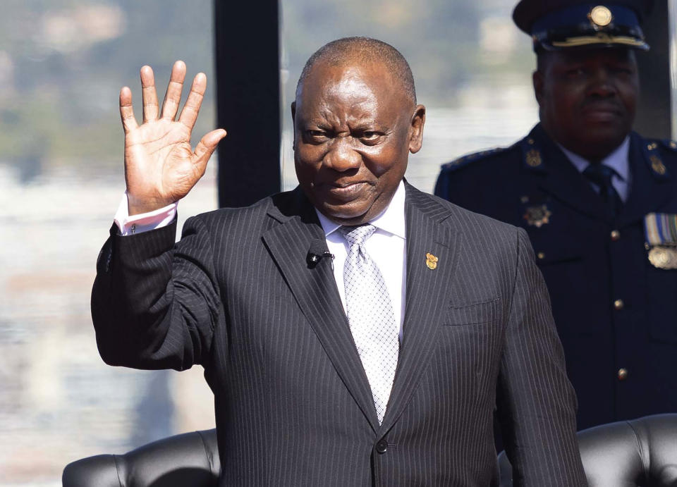 Cyril Ramaphosa waves as he arrives ahead of his inauguration as President, at the Union Buildings in Tshwane, South Africa, Wednesday June 19, 2024. (Kim Ludbrook/Pool Photo via AP)