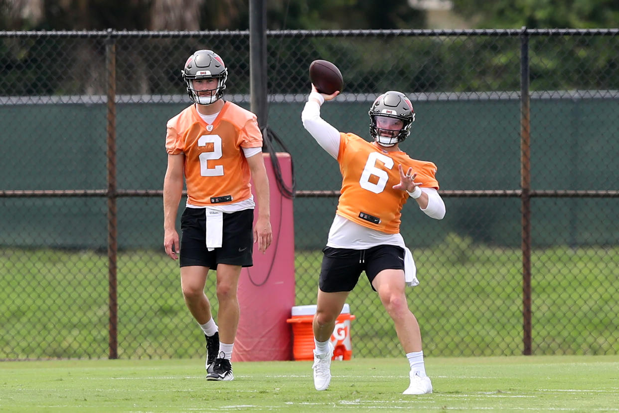 It appears neither Kyle Trask (left) nor Baker Mayfield have officially won the Buccaneers' starting job yet. (Photo by Cliff Welch/Icon Sportswire via Getty Images)