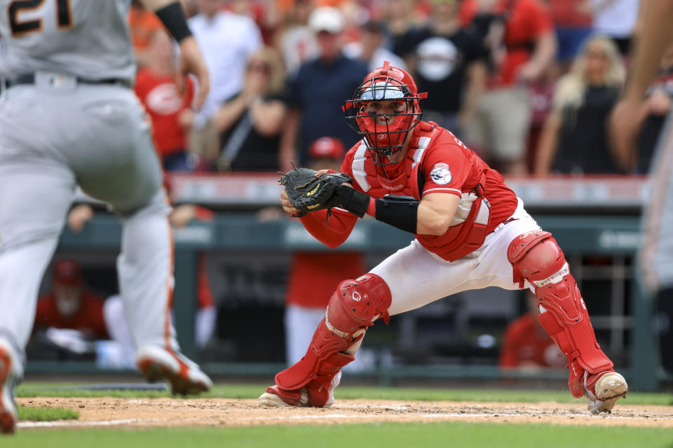 Cincinnati Reds' Tyler Stephenson waits to tag out San Francisco Giants' Joey Bart at home plate to end the baseball game in Cincinnati, Saturday, May 28, 2022. The Reds won 3-2. (AP Photo/Aaron Doster)