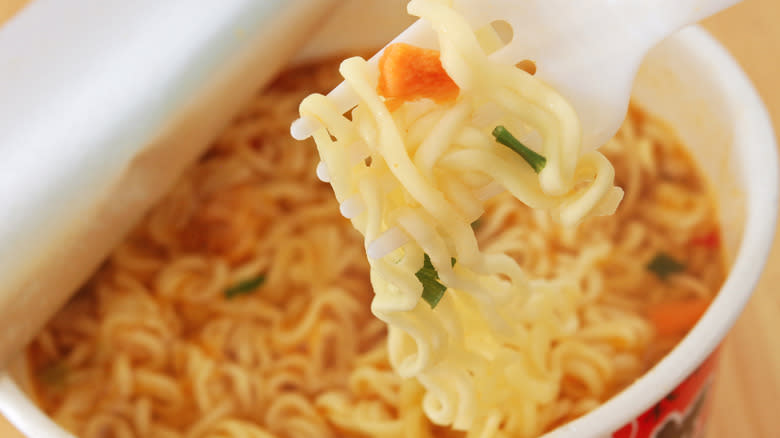 Ramen noodles with plastic fork