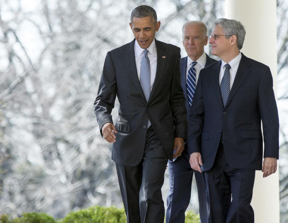 Federal appeals court judge Merrick Garland walks with President Barack Obama and Vice President Joe Biden from the Oval Office to the Rose Garden to be introduced as Obama’s nominee for the Supreme Court at the White House, in Washington, Wednesday, March 16, 2016. (AP Photo/Andrew Harnik)