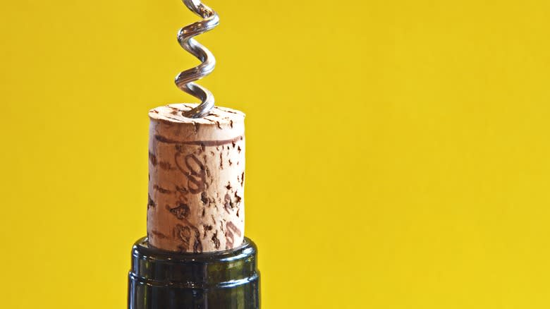 Removing cork from wine bottle