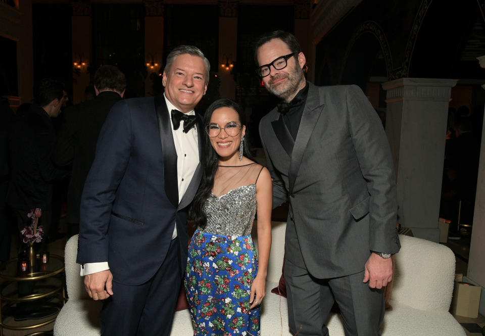 Ted Sarandos, Ali Wong, and Bill Hader smiling for a photo at a media event