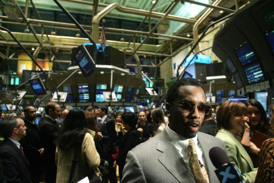 Diddy’s status as a Wall Street tycoon was on show in 2006 when he rang the New York Stock Exchange opening bell. Getty Images