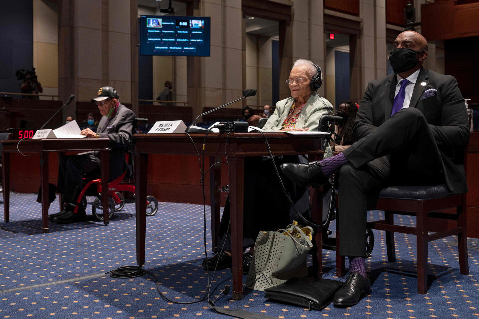 Hughes Van Ellis (left), a Tulsa Race Massacre survivor, and Viola Fletcher, the oldest living survivor, testify before the Civil Rights and Civil Liberties Subcommittee hearing on "Continuing Injustice: The Centennial of the Tulsa-Greenwood Race Massacre" on Capitol Hill in Washington, D.C., on May 19, 2021.<span class="copyright">Jim Watson—AFP/Getty Images</span>