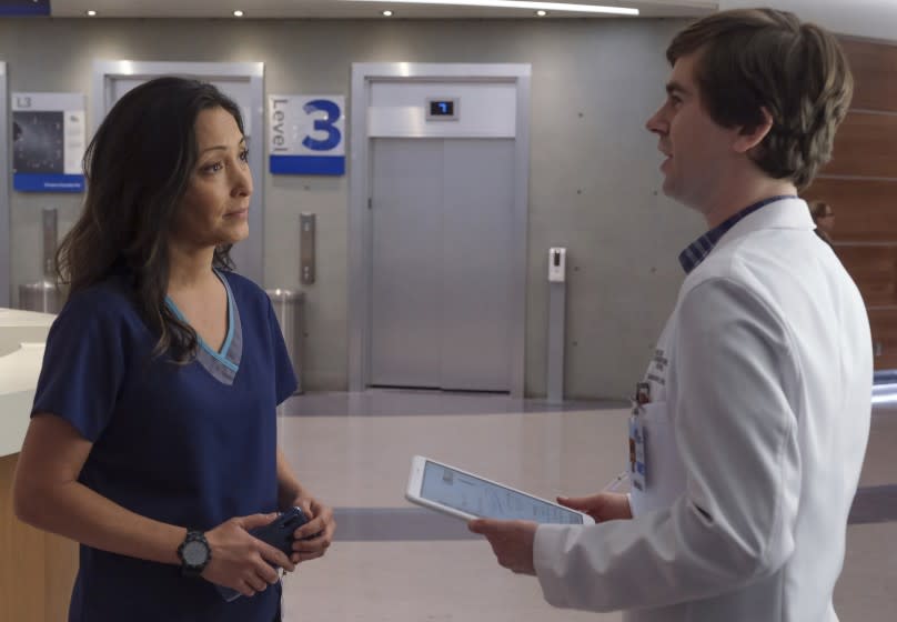 The Good Doctor -- ABC TV Series, THE GOOD DOCTOR - "Lim" – As Chief of Surgery Dr. Audrey Lim (Christina Chang) struggles to cope with the residual emotional trauma of COVID-19, she encounters a young war veteran fighting debilitating PTSD. After discussing his case with the team, Dr. Claire Browne (Antonia Thomas) suggests a radical treatment to help him. Meanwhile, still reeling from the recent loss of his mentee's patient, Dr. Shaun Murphy (Freddie Highmore) declares he doesn't want to teach the new residents anymore. And elsewhere, an eccentric patient keeps the team entertained on the winter premiere of "The Good Doctor," MONDAY, JAN. 11 (10:00-11:00 p.m. EST), on ABC. (ABC/Jeff Weddell) CHRISTINA CHANG, FREDDIE HIGHMORE Christina Chang and Freddie Highmore in "The Good Doctor" on ABC.