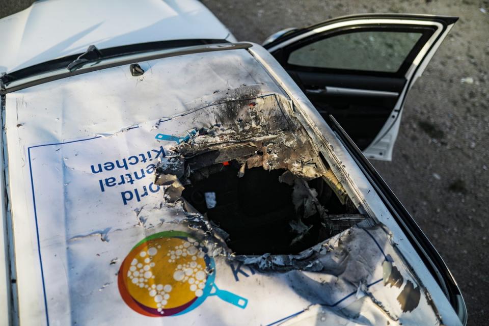 This car, bearing the World Central Kitchen logo, was targeted by an Israeli airstrike, the aid organisation said. (EPA)