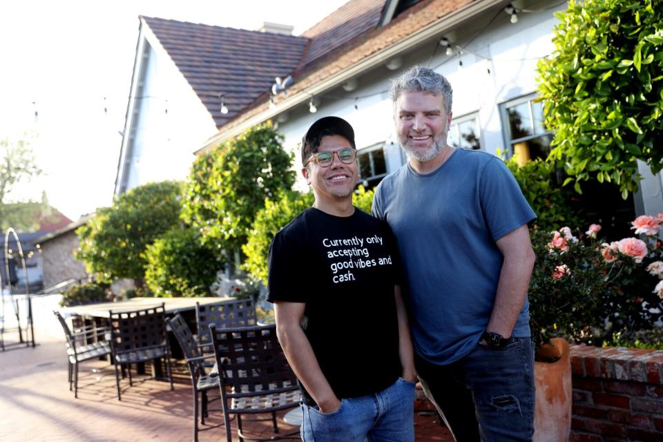 Matthew and Kiel Cavalli stand outside in Solvang.