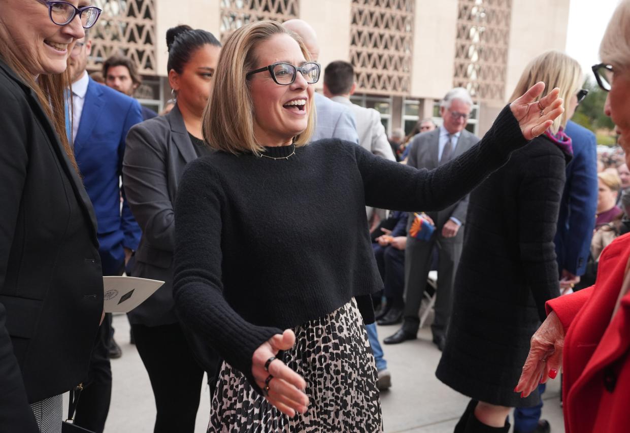 Sen. Kyrsten Sinema greets people during the ceremonial inauguration of Governor Katie Hobbs at the Arizona State Capitol in Phoenix on Thursday, Jan. 5, 2023.