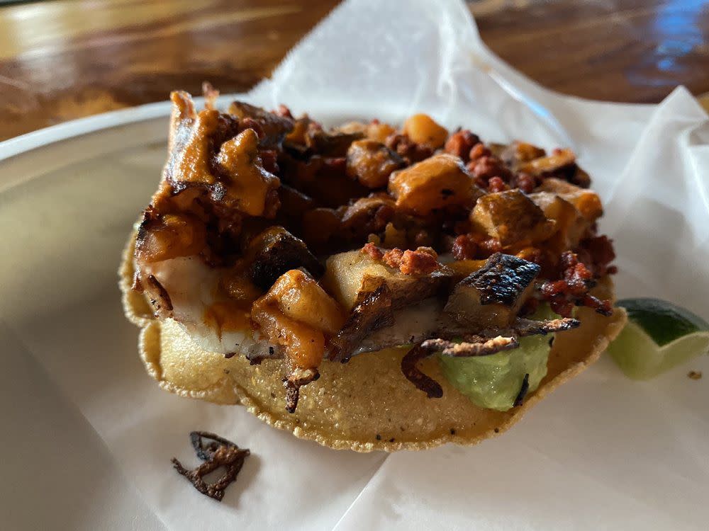 a choripapa tostada from Con Todo food truck in Austin, TX