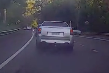 An angry ute driver cut in front of another driver, before slamming on his brakes. Source: Facebook/Dash cam owners Australia