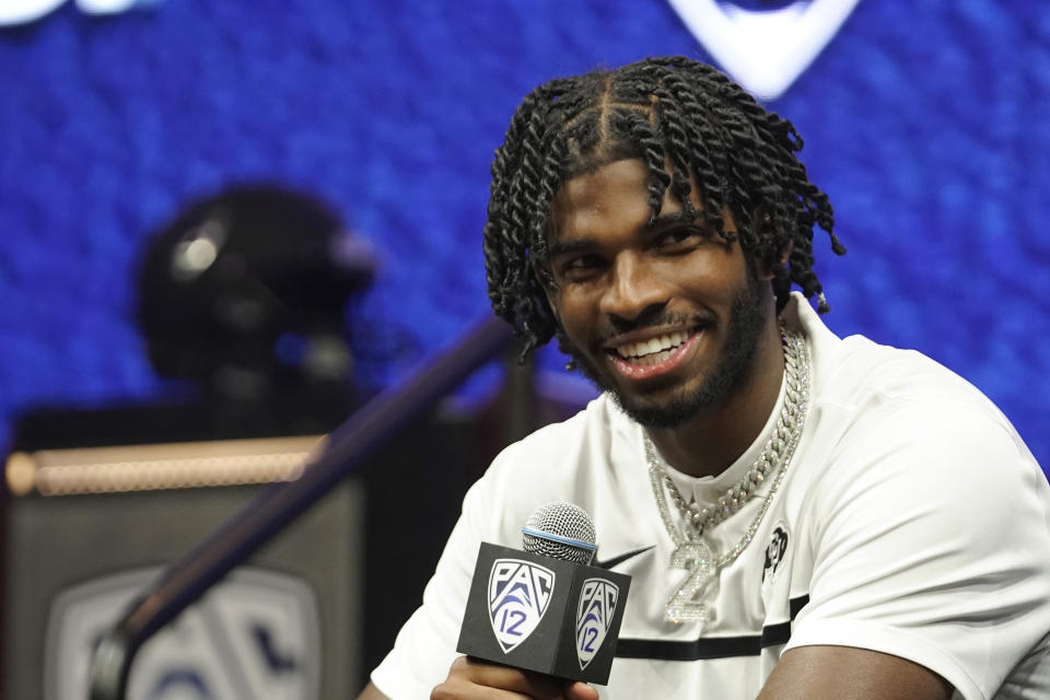 Colorado quarterback Shedeur Sanders speaks at an NCAA college football Pac-12 media day Friday, July 21, 2023, in Las Vegas. (AP Photo/Lucas Peltier)