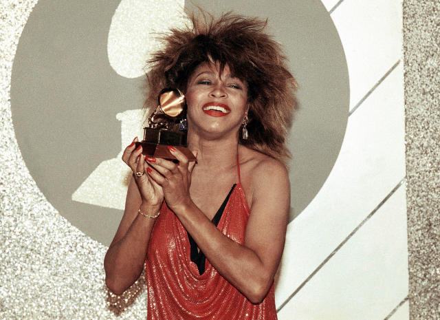 FILE - Tina Turner, Pop and R&B vocalist, as holds up a Grammy Award, Feb. 27, 1985, in Los Angeles. Turner, the unstoppable singer and stage performer, died Tuesday, after a long illness at her home in Küsnacht near Zurich, Switzerland, according to her manager. She was 83 (AP Photo/Nick Ut, File)