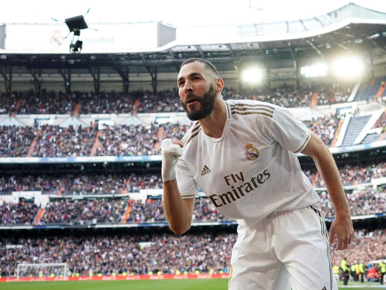 Karim Benzema celebrates scoring Real Madrid's winning goal: Reuters