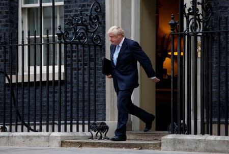 Britain's Prime Minister Boris Johnson arrives to deliver a speech outside Downing Street, in London