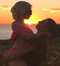 <p>Talk about a perfect sunset. The songstress shared this stunning photo of herself cradled in boyfriend Christian Carino’s arms, while wearing a flouncy pink bikini, as the sun went down on Sunday. “Night night, Sunday Funday,” she wrote. (Photo: <a rel="nofollow noopener" href="https://www.instagram.com/ladygaga/" target="_blank" data-ylk="slk:Lady Gaga via Instagram;elm:context_link;itc:0;sec:content-canvas" class="link ">Lady Gaga via Instagram</a>) </p>