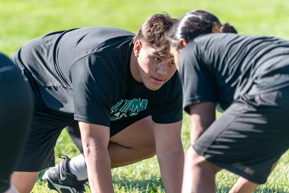 Sultana's Caleb Pele lines up for a drill during a recent summer football practice at the school. Sultana begins the season on the road against Lancaster on Aug. 18.