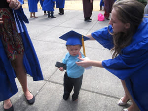 Chelcee (right) and her son at her graduation from the Pima Medical Institute in Washington.