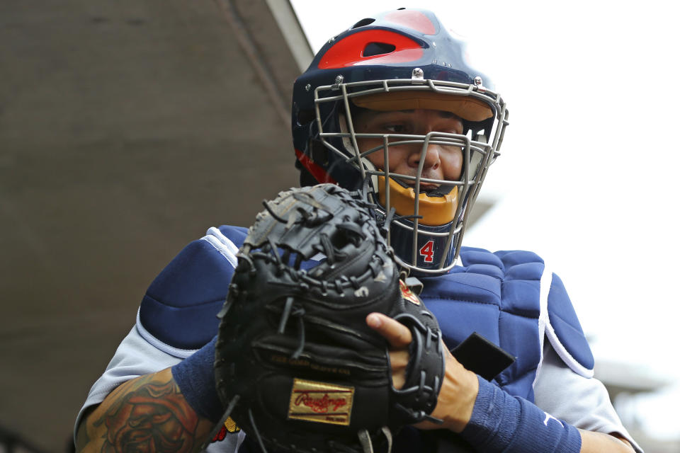 Yadier Molina experienced one of the most painful moments of his career on Saturday against the Cubs. (AP Photo)