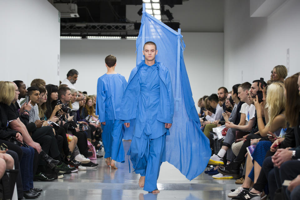 LONDON, ENGLAND - JUNE 17: Models walk the runway at the Craig Green show during the London Collection: Men SS15 on June 17, 2014 in London, England.  (Photo by Tristan Fewings/Getty Images)