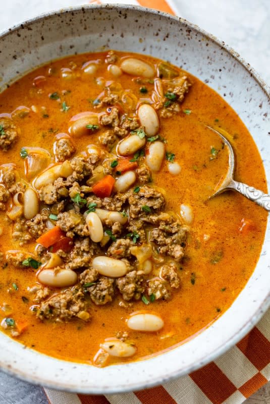 <p>Family Style Food</p><p>Comfort food to love — this is a creamy pumpkin chili simmered with turkey, spices and cannellini beans that makes a simple soul-warming bowl. Stovetop or pressure cooker recipe.</p><p><strong>Get the recipe: <a href="https://familystylefood.com/turkey-pumpkin-chili/" rel="nofollow noopener" target="_blank" data-ylk="slk:Creamy White Bean and Turkey Pumpkin Chili;elm:context_link;itc:0;sec:content-canvas" class="link rapid-noclick-resp"><em>Creamy White Bean and Turkey Pumpkin Chili</em></a></strong></p>