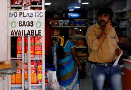 A notice is pasted outside a shop stating the unavailability of plastic bags at a market in Mumbai, India, June 27, 2018. REUTERS/Danish Siddiqui