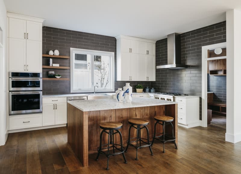 Modern kitchen with the hardwood floors.