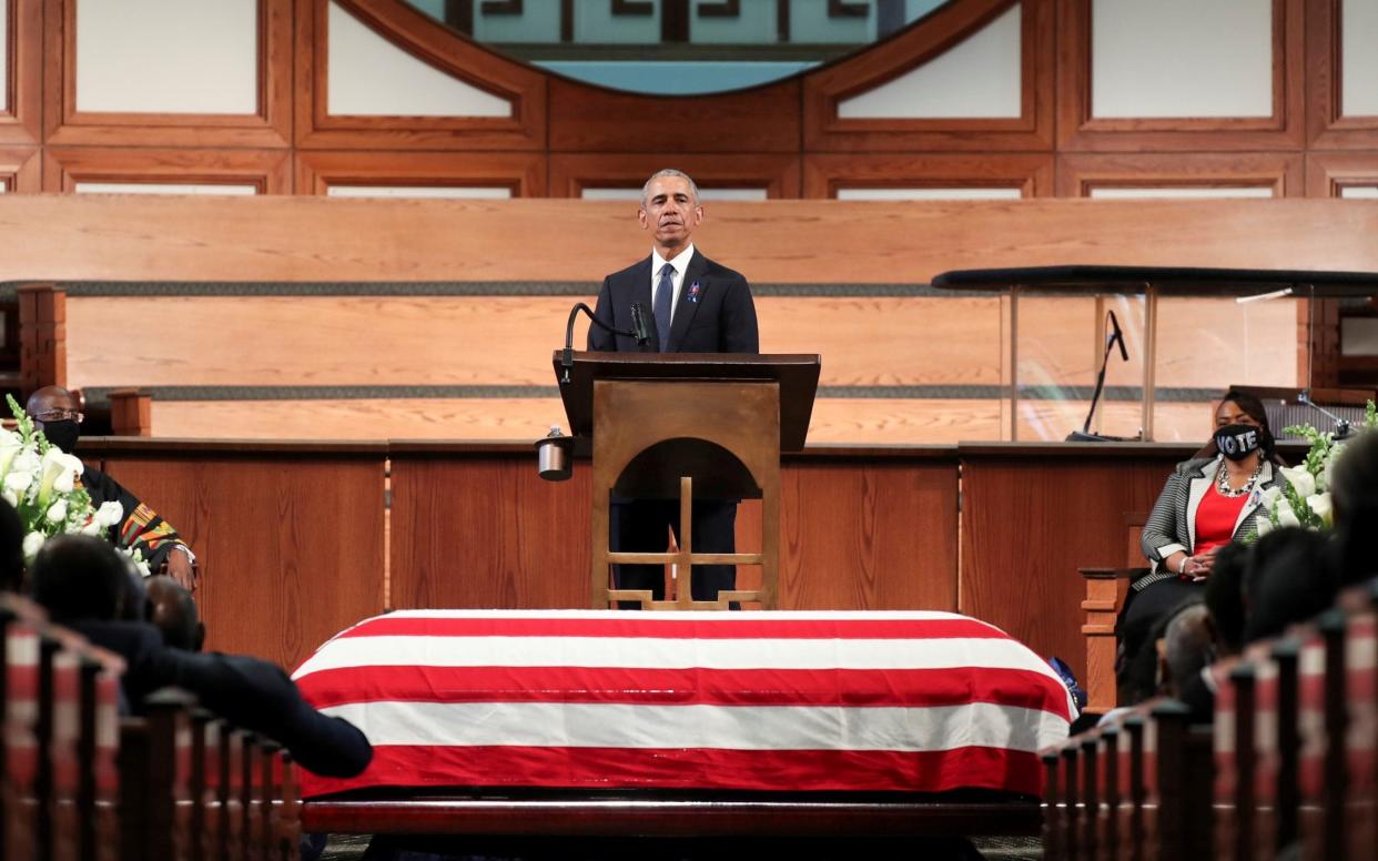 Former U.S. President Barack Obama addresses the service during the funeral of late U.S. Congressman John Lewis - REUTERS