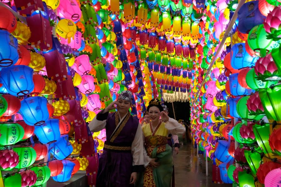 Buddhists walk past lanterns during the Lotus Lantern Festival, ahead of the birthday of Buddha at Dongguk University in Seoul, South Korea, Saturday, May 11, 2024. (AP Photo/Ahn Young-joon)