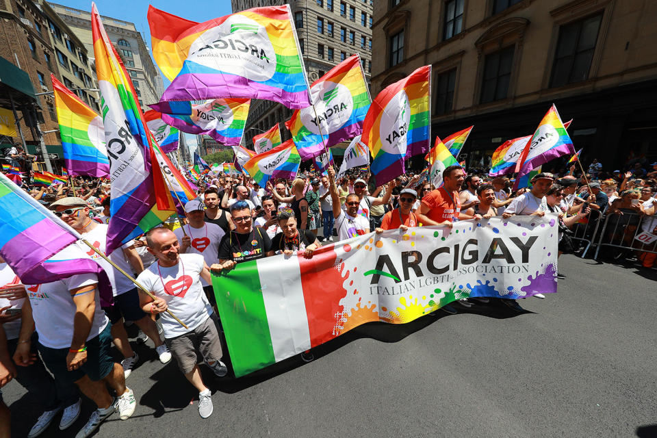 The Italian LGBTI Association carry a banner and wave flags  during the NYC Pride Parade in New York, Sunday, June 30, 2019. (Gordon Donovan/Yahoo News) 