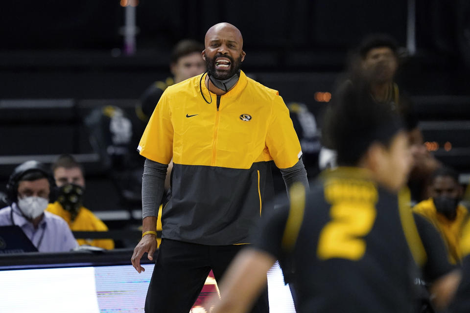 FILE - In this Jan. 16, 2021, file photo, Missouri coach Cuonzo Martin yells to the team during the second half of an NCAA college basketball game against Texas A&M in College Station, Texas. (AP Photo/Sam Craft, File)