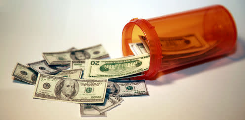 <span class="caption">Rare diseases have turned into big business.</span> <span class="attribution"><a class="link " href="http://www.shutterstock.com/pic-12519463/stock-photo-money-pours-out-of-a-pill-bottle-representing-the-high-cost-of-health-care-and-medication-concepts.html?src=tW6Tv3C2CO7Hsj2h-IPKcw-1-32" rel="nofollow noopener" target="_blank" data-ylk="slk:Mikelederay/www.shutterstock.com;elm:context_link;itc:0;sec:content-canvas">Mikelederay/www.shutterstock.com</a></span>