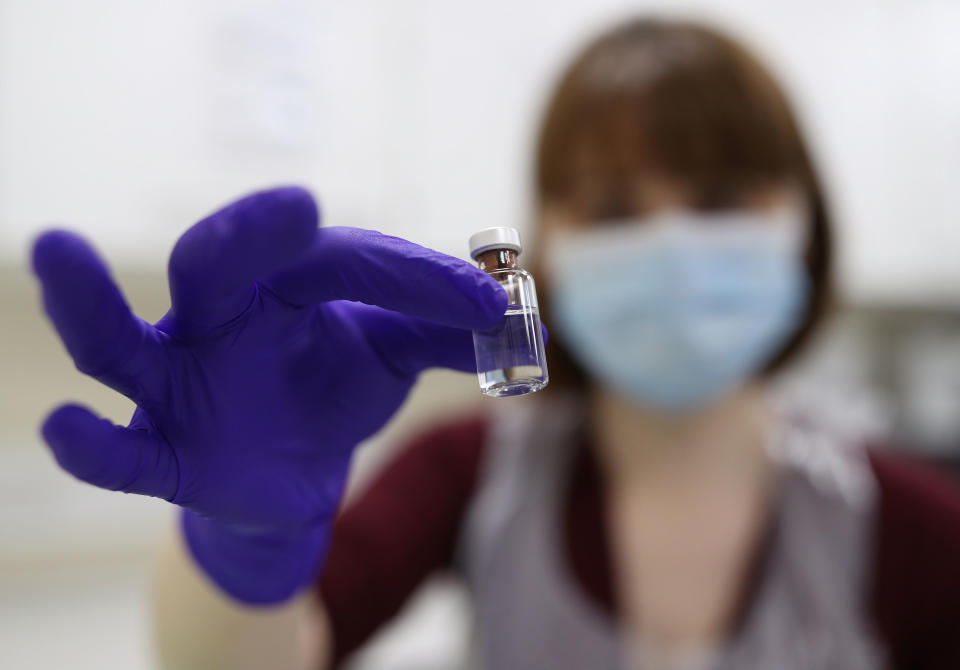 LONDON, ENGLAND - DECEMBER 05: An NHS pharmacy technician at the Royal Free Hospital, London, simulates the preparation of the Pfizer vaccine to support staff training ahead of the rollout, on December 5, 2020 in London, England. (Photo by Yui Mok - WPA Pool/Getty Images)