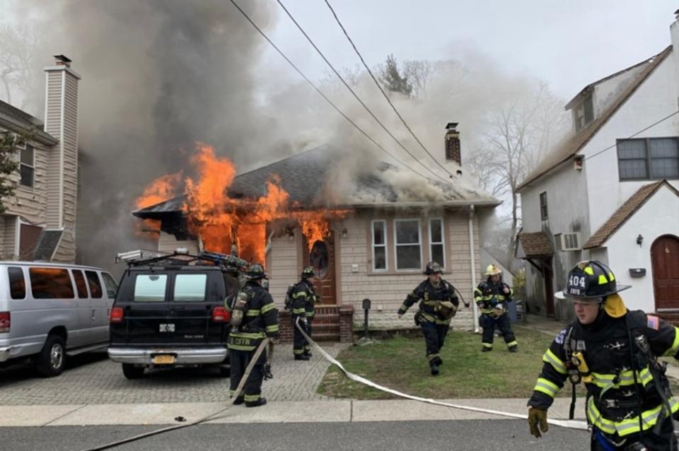 Firefighters seen on March 20, 2020 fighting the blaze. East Rockaway Fire Department