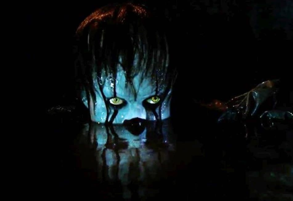 Pennywise surfaces in <em>It</em> (Photo: Warner Bros.)