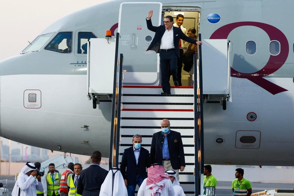 US citizens Siamak Namazi (C-back), Emad Sharqi (bottom-L) and Morad Tahbaz (bottom-R) disembark from a Qatari jet upon their arrival at the Doha International Airport in Doha on September 18, 2023. Five US detainees, three previously identified as Siamak Namazi, Morad Tahbaz and Emad Sharqi and two who wish to remain anonymous, released by Iran landed in Doha in a prisoner swap on September 18 after $6 billion in frozen funds were transferred to Iranian accounts in Qatar. (Photo by Karim JAAFAR / AFP) (Photo by KARIM JAAFAR/AFP via Getty Images)