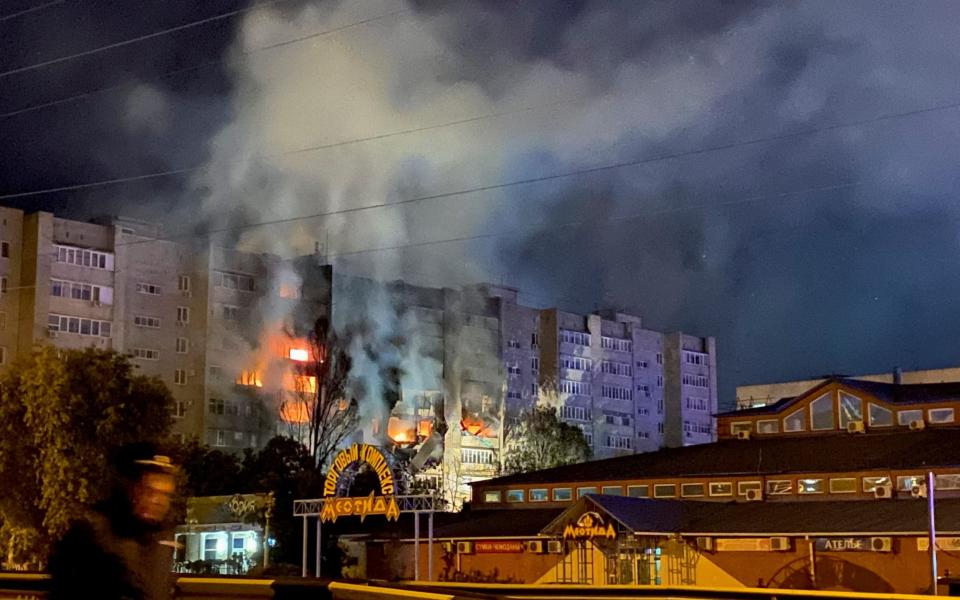 A view shows a site of a plane crash on residential building in the southern city of Yeysk -  REUTERS