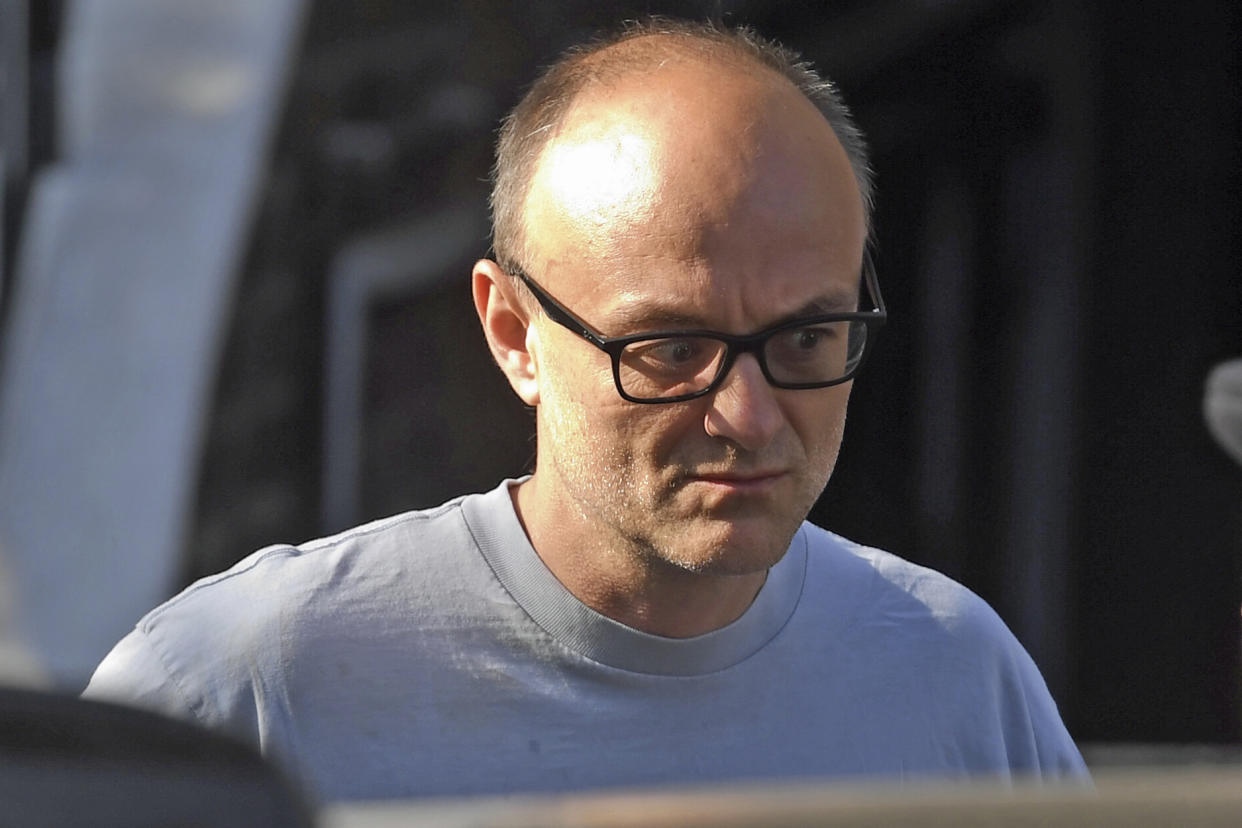 Dominic Cummings, top aide to British Prime Minister Boris Johnson, leaves his home in north London, Wednesday, May 27, 2020. The British government faced accusations of hypocrisy after the revelation that  Cummings traveled more than 250 miles (400 kms) to his parents' house during a nationwide lockdown while he was showing coronavirus symptoms. (Kirsty O'Connor/PA via AP)