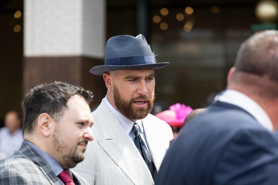 Kansas City Chiefs tight end Travis Kelce (center, white suit), boyfriend to superstar pop artist Taylor Swift, is seen at the 150th Kentucky Derby on May 4, 2024, in Louisville, Ky.