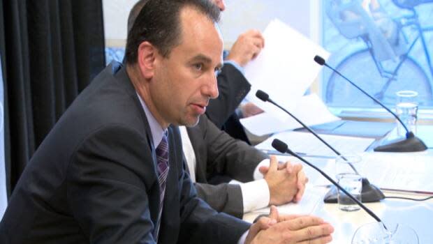 John Manconi speaks to reporters in 2014, long before he would become the public face of the city's LRT network and its many missteps. (CBC - image credit)