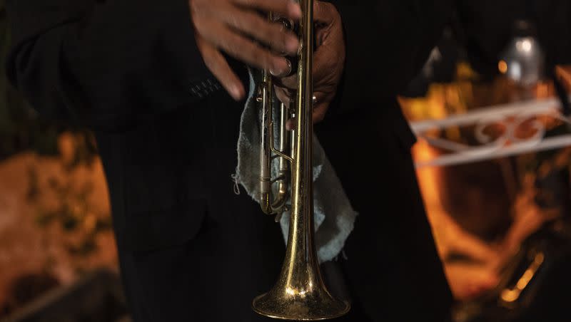 A trumpeter plays a concert with Bolero singer Idania Valdés in Old Havana, Cuba, Sunday, Jan. 21, 2024. To keep the brain healthy and reduce the risk of dementia as you age, researchers suggest playing a musical instrument.