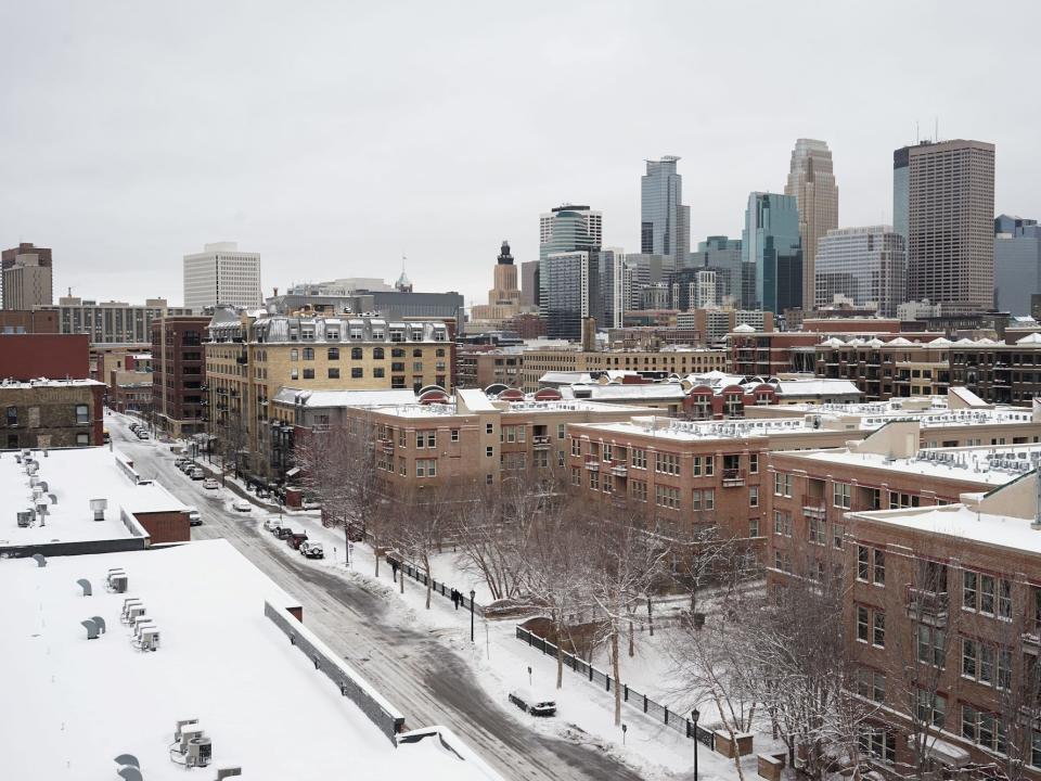 Downtown Minneapolis is blanketed in snow during the spring snowstorm in Minneapolis, Minnesota, U.S., April 11, 2019.
